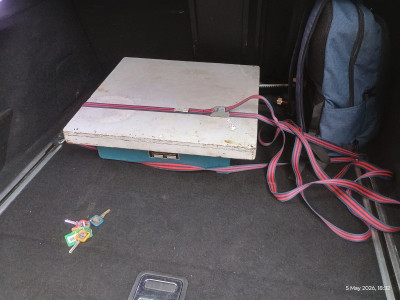 In the boot, tied down
