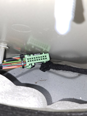 Live unused wiring harness in left rear boot