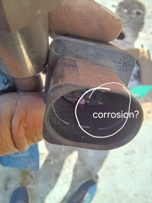 The original 02 sensor with green stuff...