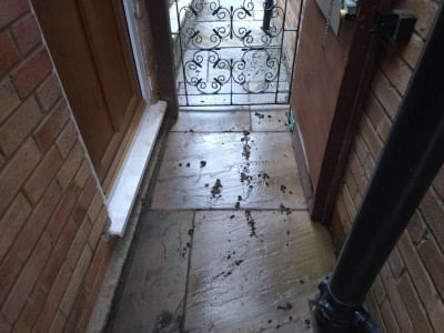 There was a stream flowing through our walkway where the soakaway couldn't cope